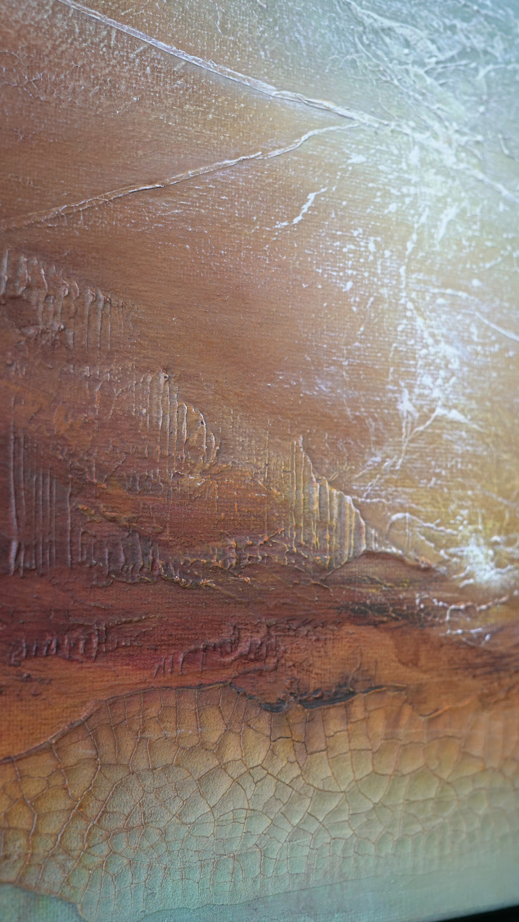 An abstract textured painting featuring a landscape-like scene with layered brown, tan, and cream tones, rendered with thick impasto brushstrokes and fine crackled lines.