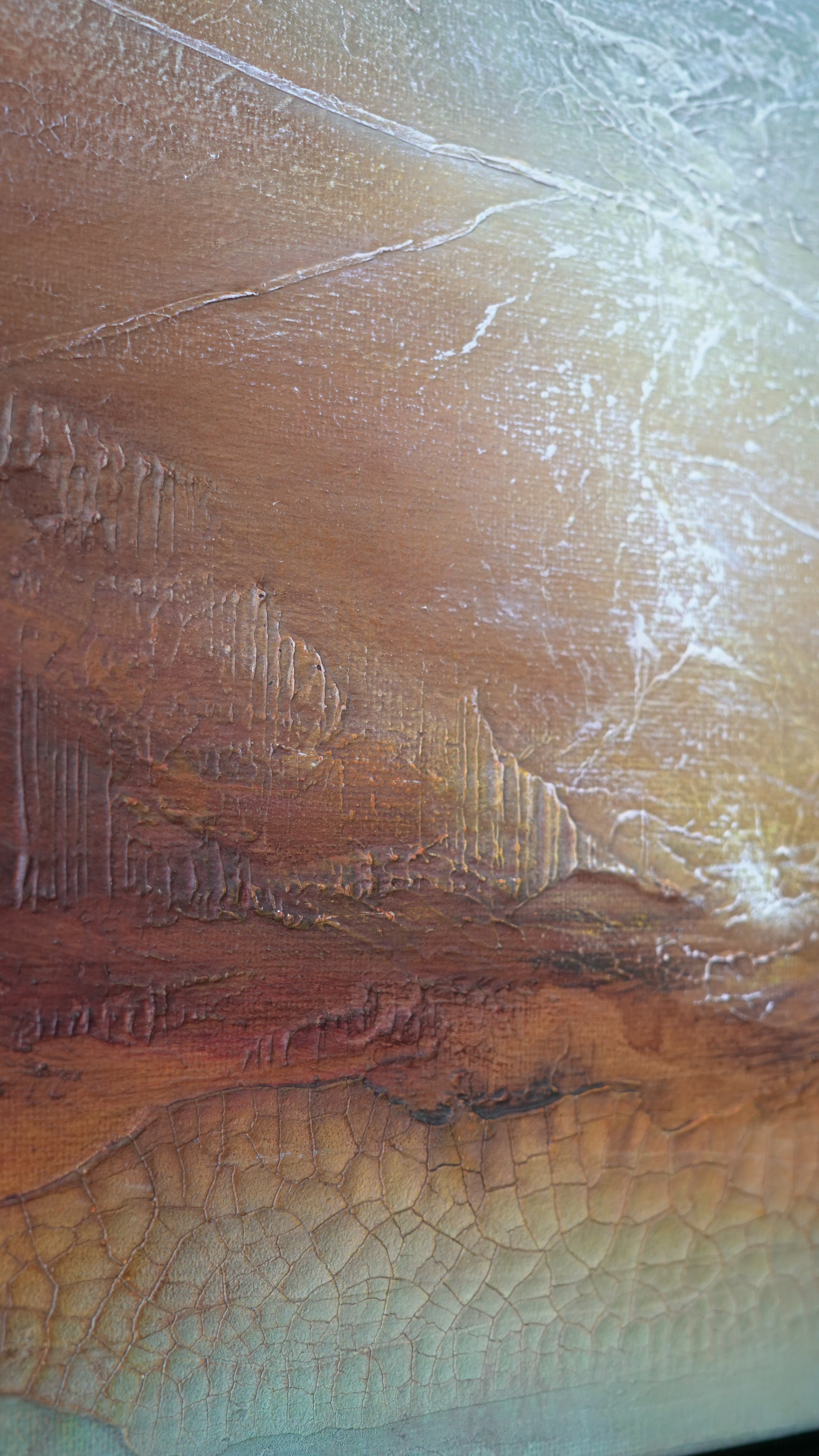 An abstract textured painting featuring a landscape-like scene with layered brown, tan, and cream tones, rendered with thick impasto brushstrokes and fine crackled lines.