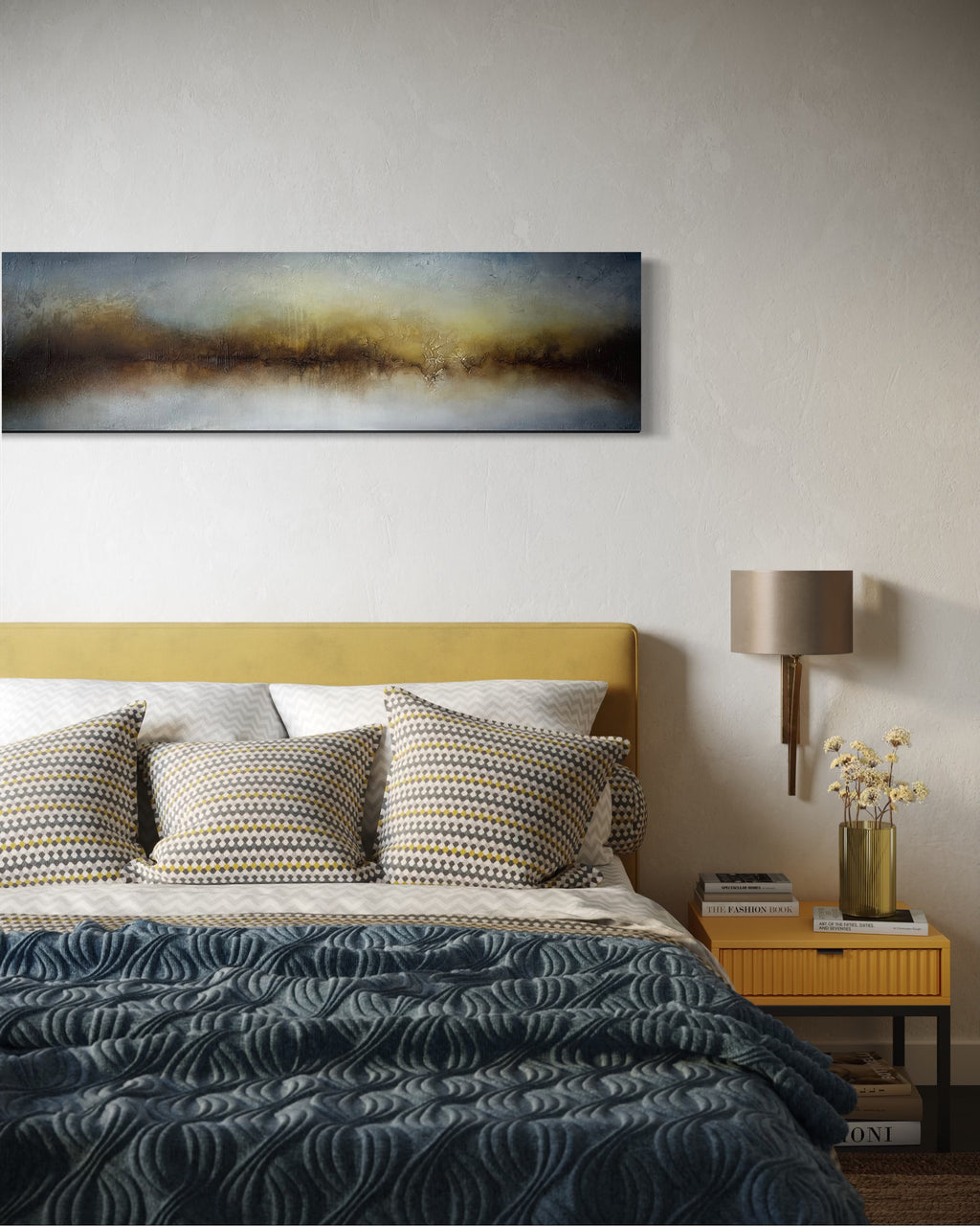 Force, an original unframed panoramic abstract painting in blue, gold and brown tones displayed above a bed
